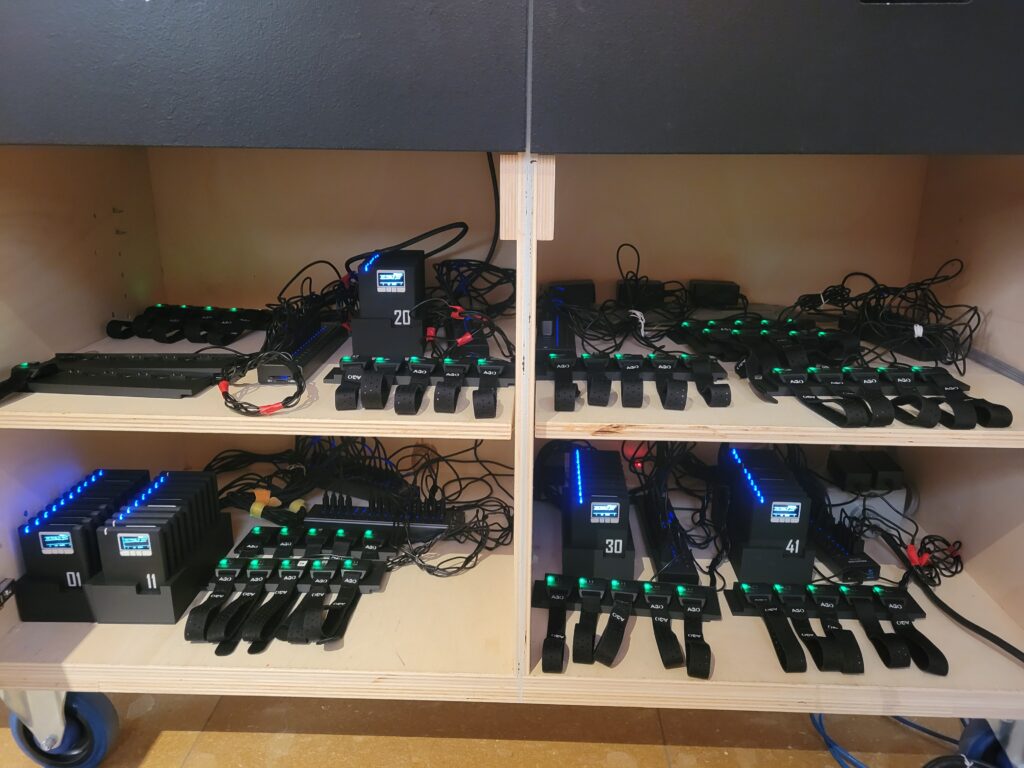 Units charged and ready for use in the inside of the Art Rate Monitor cart